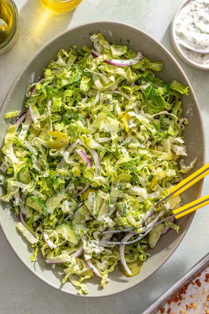 Creamy dill pickle salad lightly tossed with Greek yogurt pickle ranch