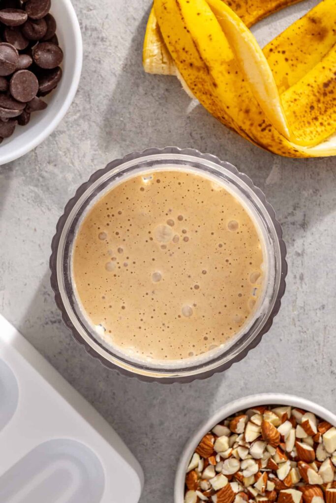 Smooth banana Greek yogurt ice cream mixture prepared for homemade ice cream bars