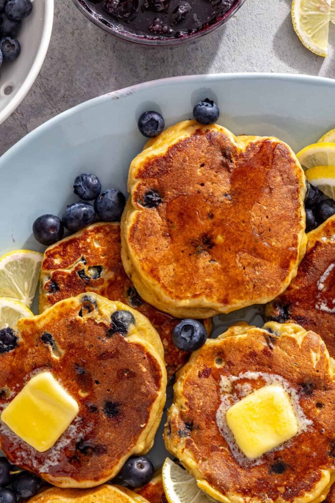 Golden lemon cottage cheese pancakes topped with melting butter