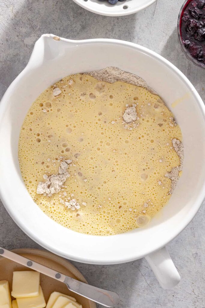 Wet and dry ingredients gently combined for lemon blueberry cottage cheese pancakes