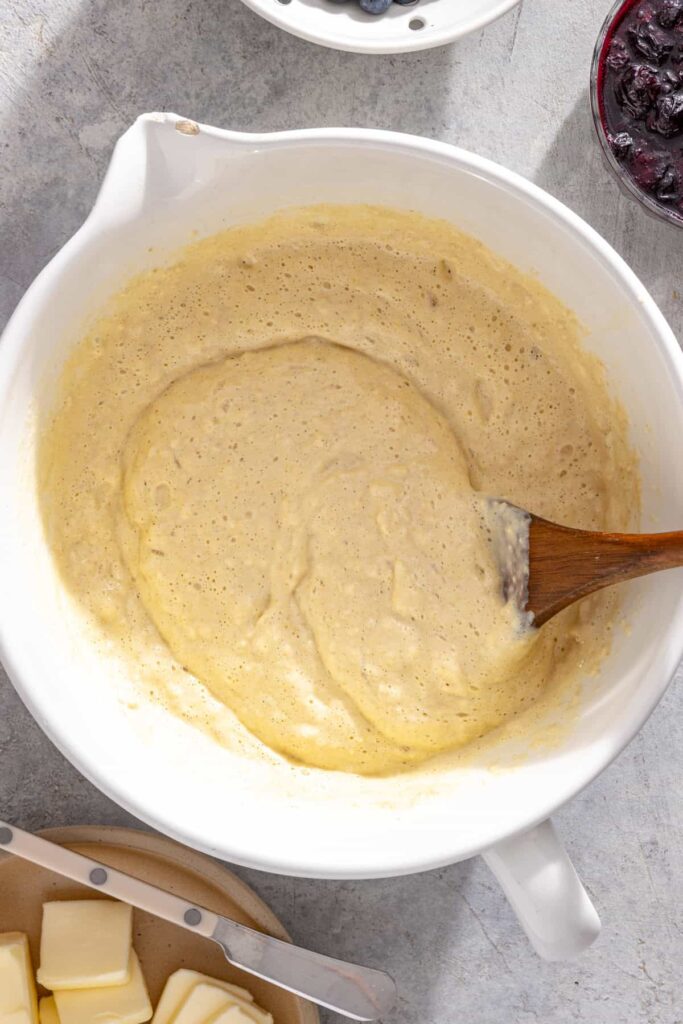 Cottage cheese pancake batter being gently folded until just combined