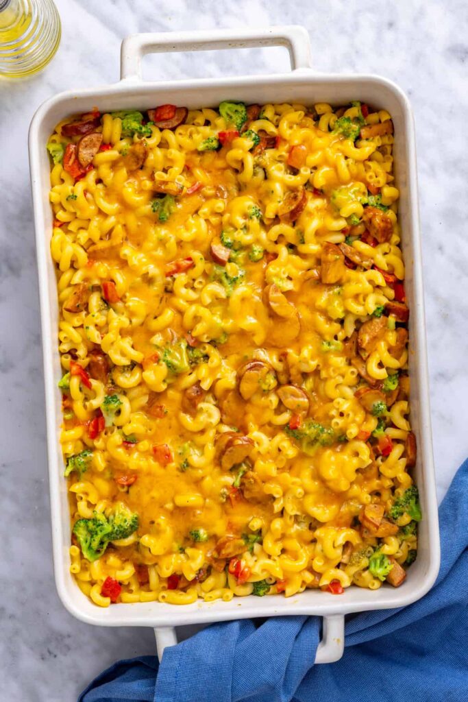Baked broccoli cheddar pasta resting in the casserole dish before serving