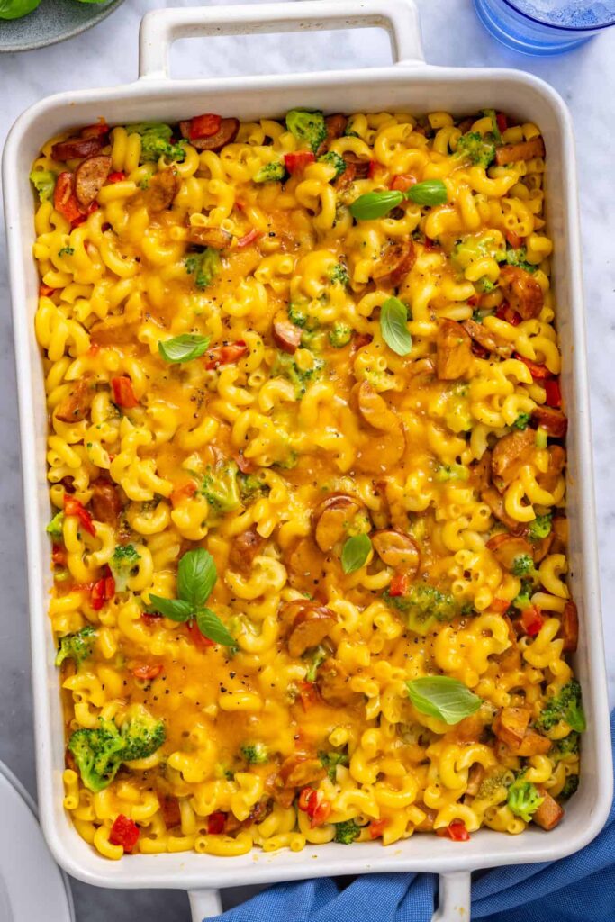 Golden baked broccoli cheddar pasta served in a 9x13 casserole dish