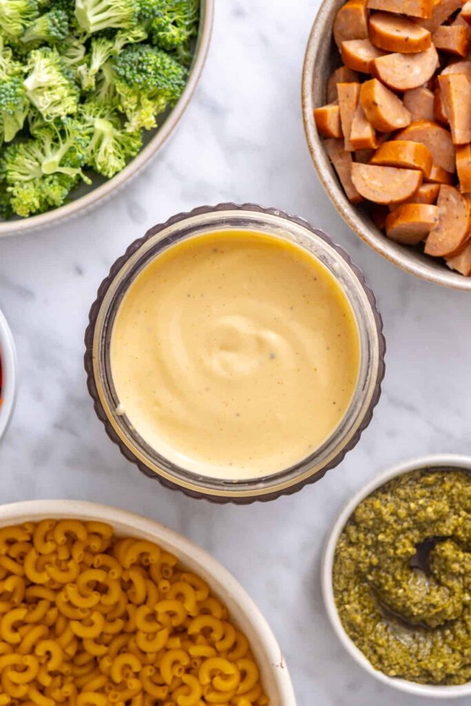 Smooth cottage cheese and cheddar cheese sauce blended for broccoli cheddar pasta