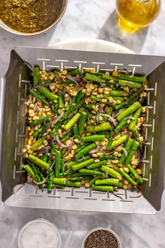 Grilled asparagus, corn and red onion with lightly charred edges