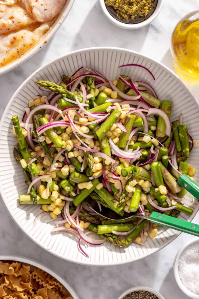 Corn, asparagus and sliced red onion tossed with olive oil and sea salt