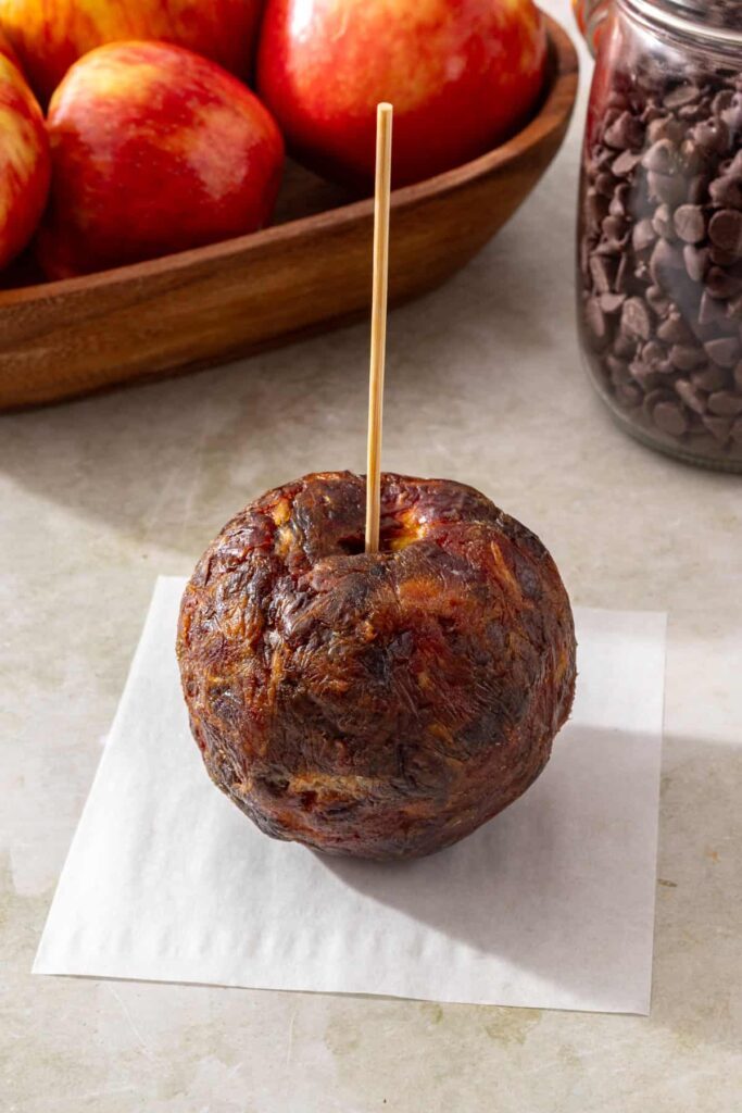 Apple completely wrapped in a layer of dates before chilling