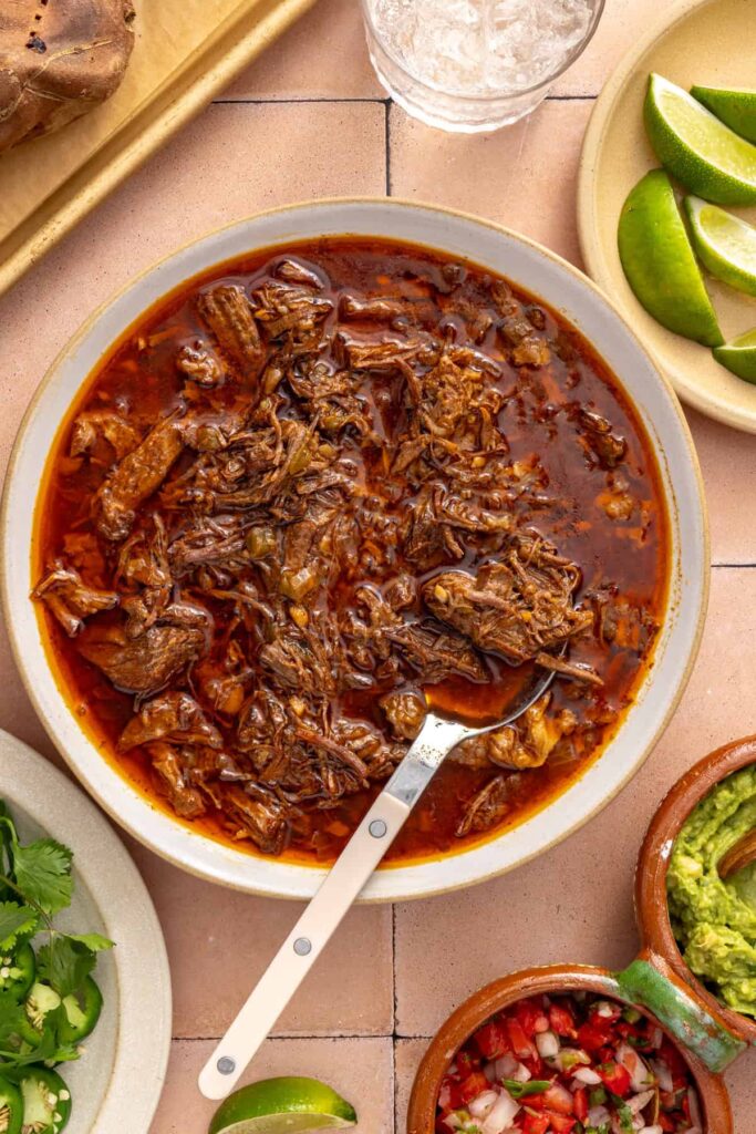 bowl of shredded beef chuck roast, ready for stuffed sweet potatoes
